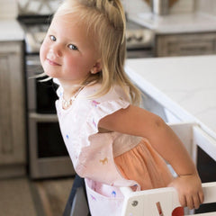 Tiny Twinkle lightweight soft mealtime bib demonstrates comfortable movement for toddlers