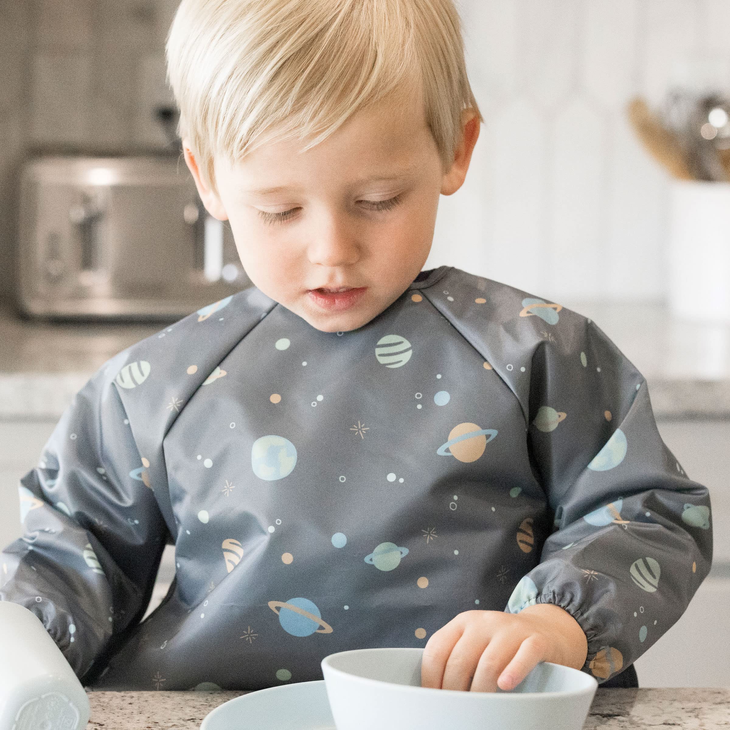 Tiny Twinkle long sleeve bib back view shows full coverage for messy eaters.