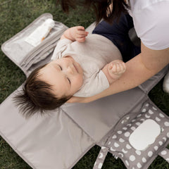 Tiny Twinkle Luna travel-changing-station turns any surface clean for baby