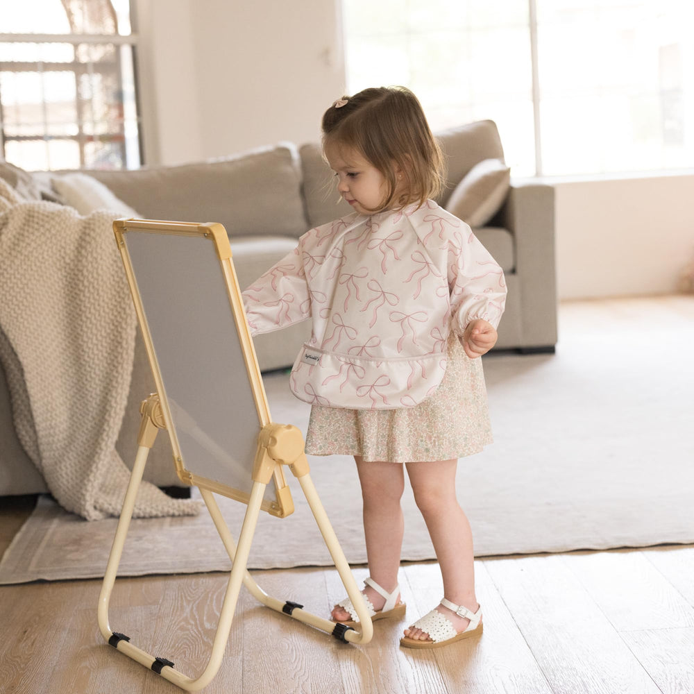 Tiny Twinkle machine washable fabric simplifies cleanup after meals.