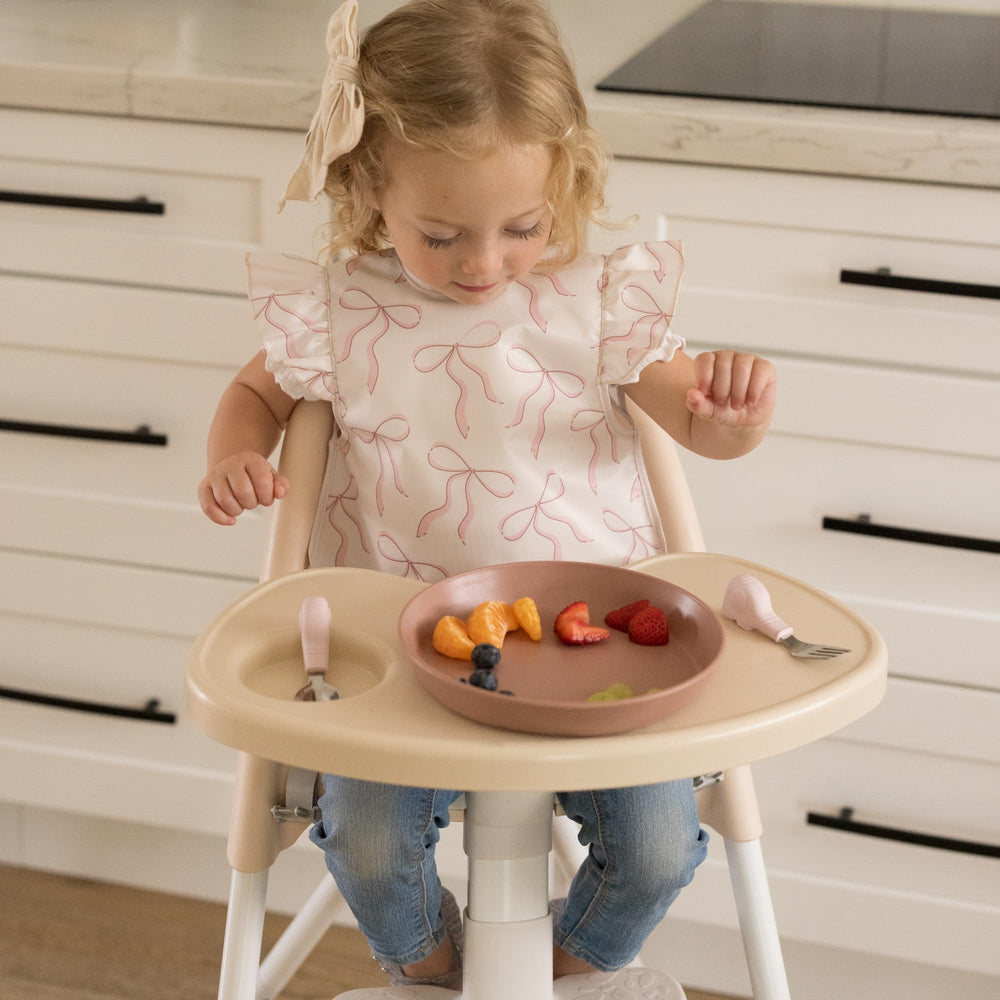 Tiny Twinkle machine washable bib simplifies cleanup after meals