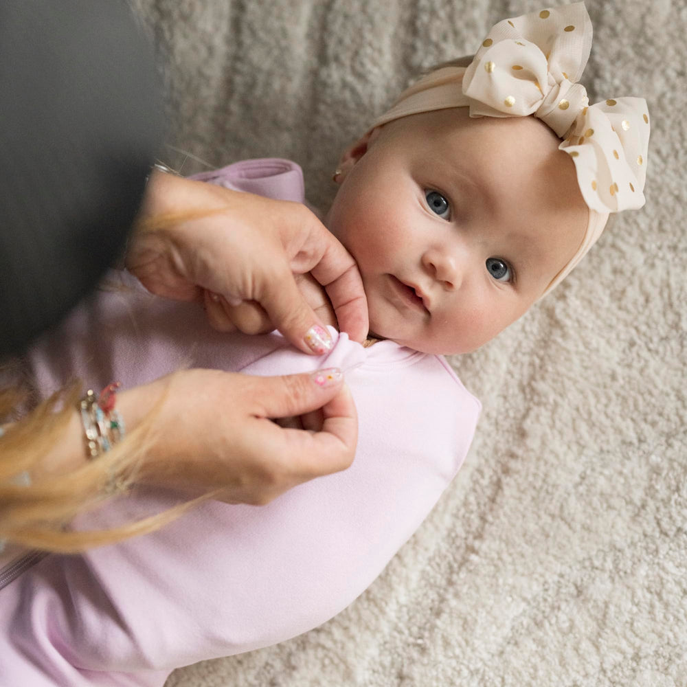 Tiny Twinkle machine-washable feature highlights easy cleanup between sleeps