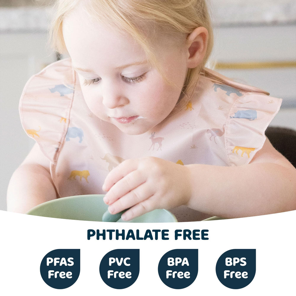 Tiny Twinkle Mess-Proof Bib with deep catch pocket keeps crumbs off clothes.