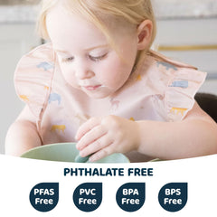 Tiny Twinkle Mess-Proof Bib with deep catch pocket keeps crumbs off clothes.
