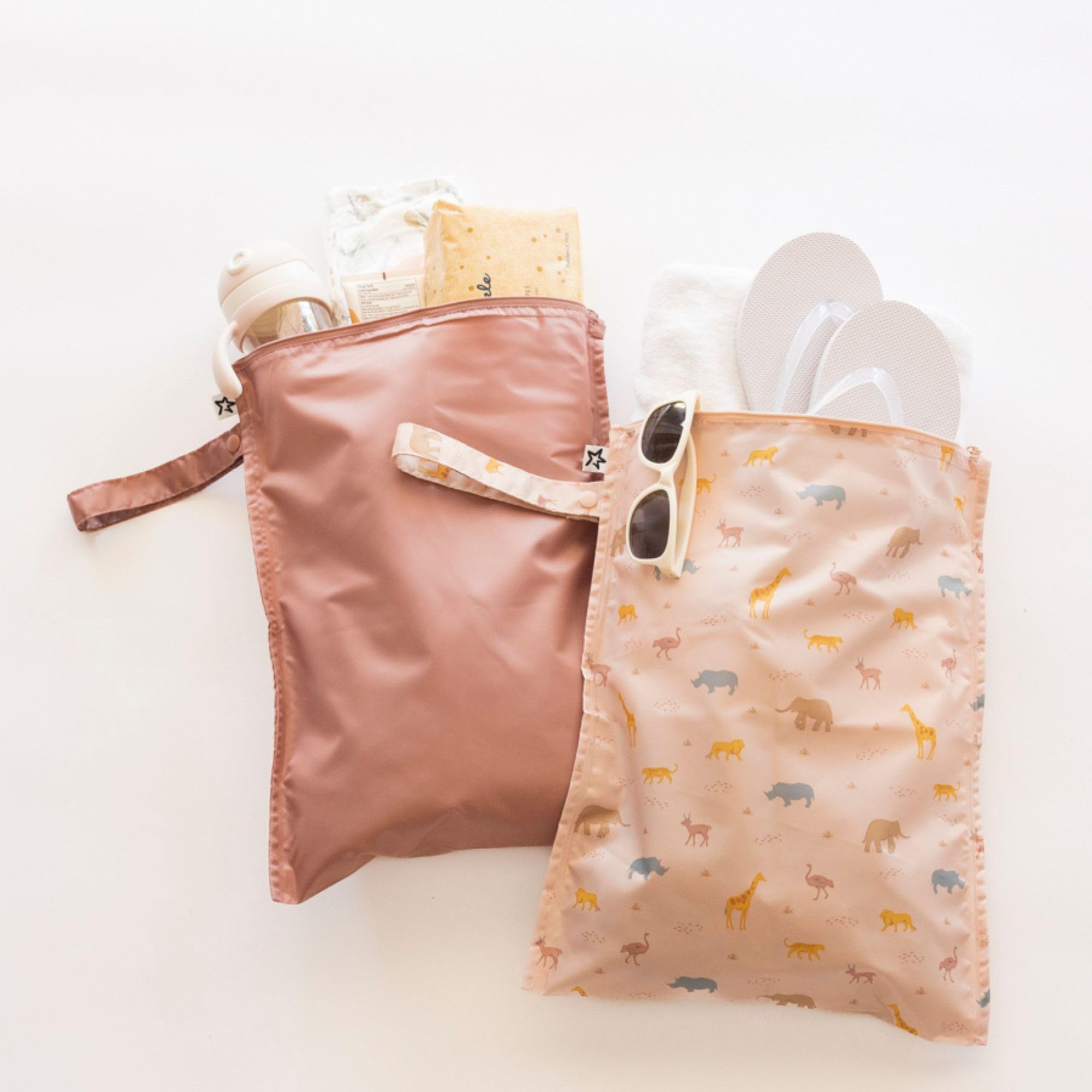 Tiny Twinkle Mess-Proof Wet Bag folded flat for compact storage