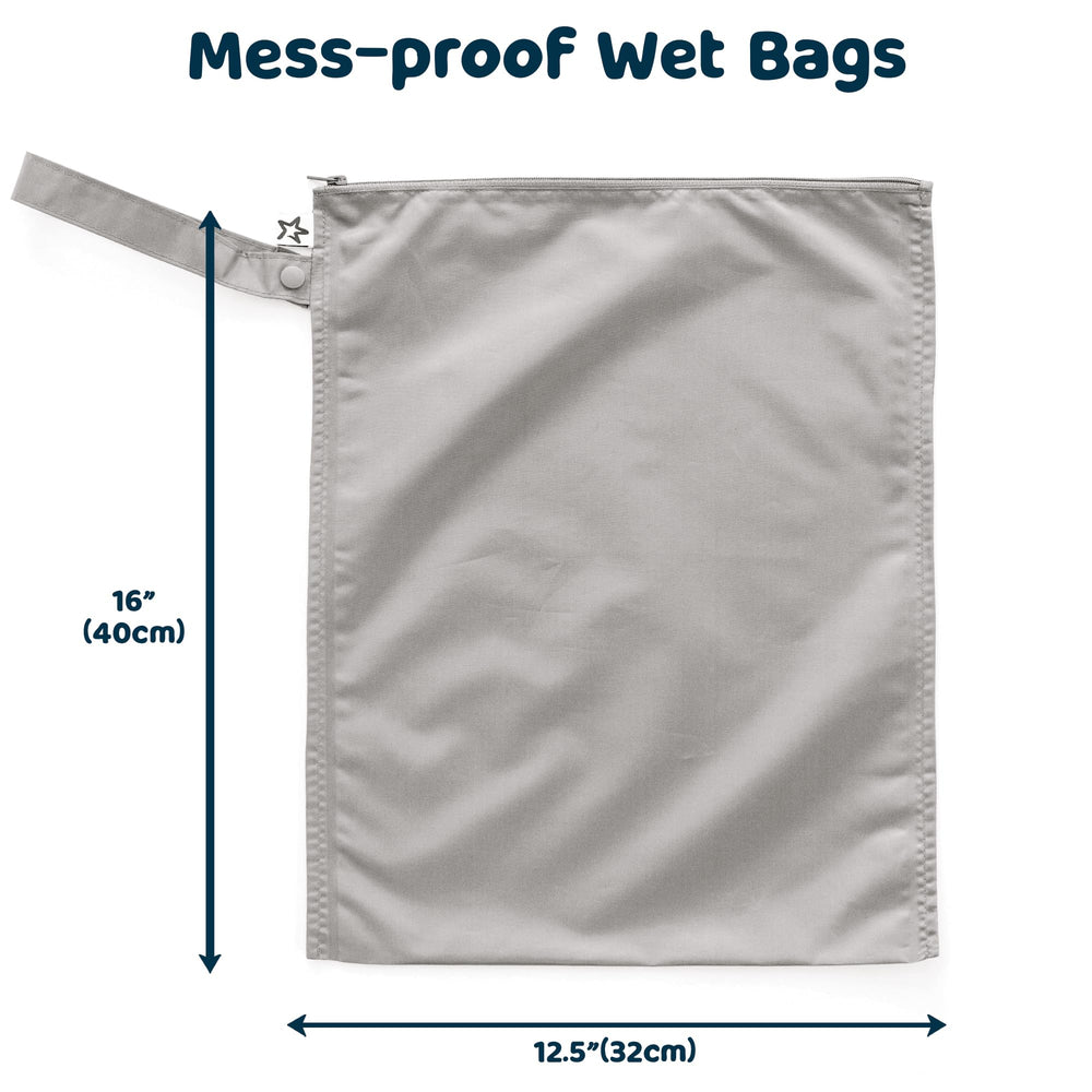 Tiny Twinkle Mess Proof Wet Bag indigo, open, ready to hold swimsuits and baby clothes.