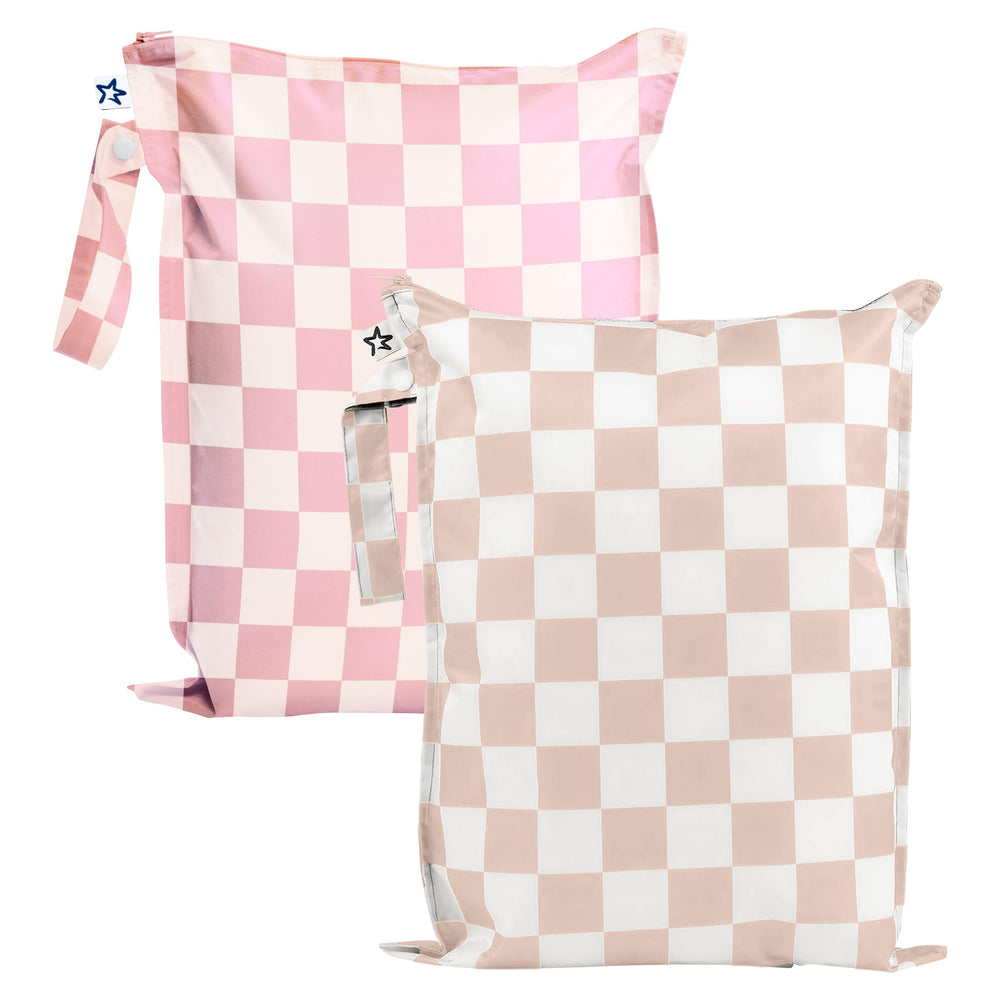 Tiny Twinkle Mess Proof Wet Bag pink checkers open for quick packing after a pool day