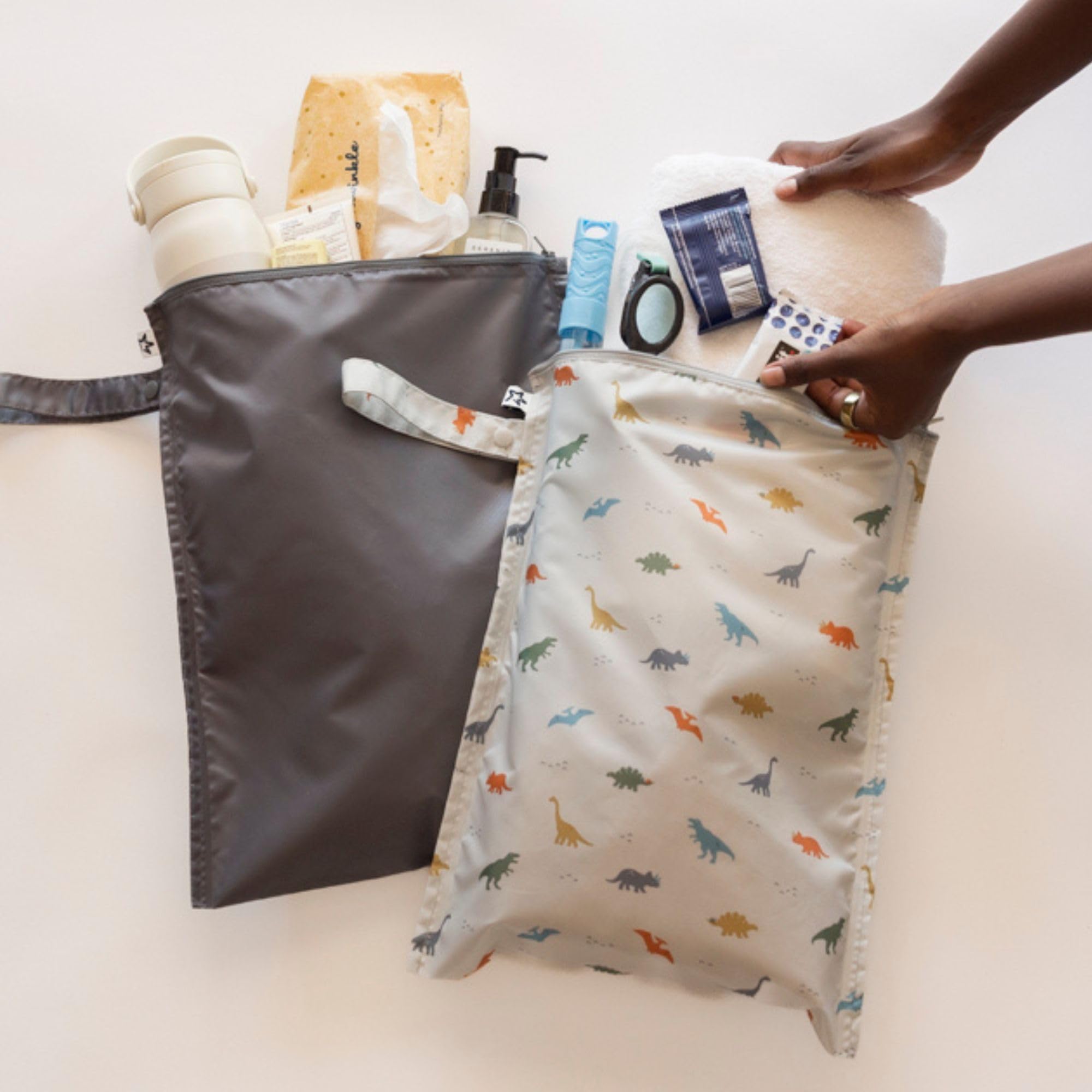 Tiny Twinkle wet bag for swimsuits keeps moisture away during trips.