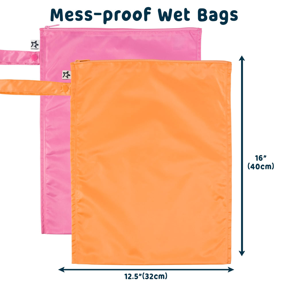 Beach scene with Tiny Twinkle wet bags for damp swimwear organization