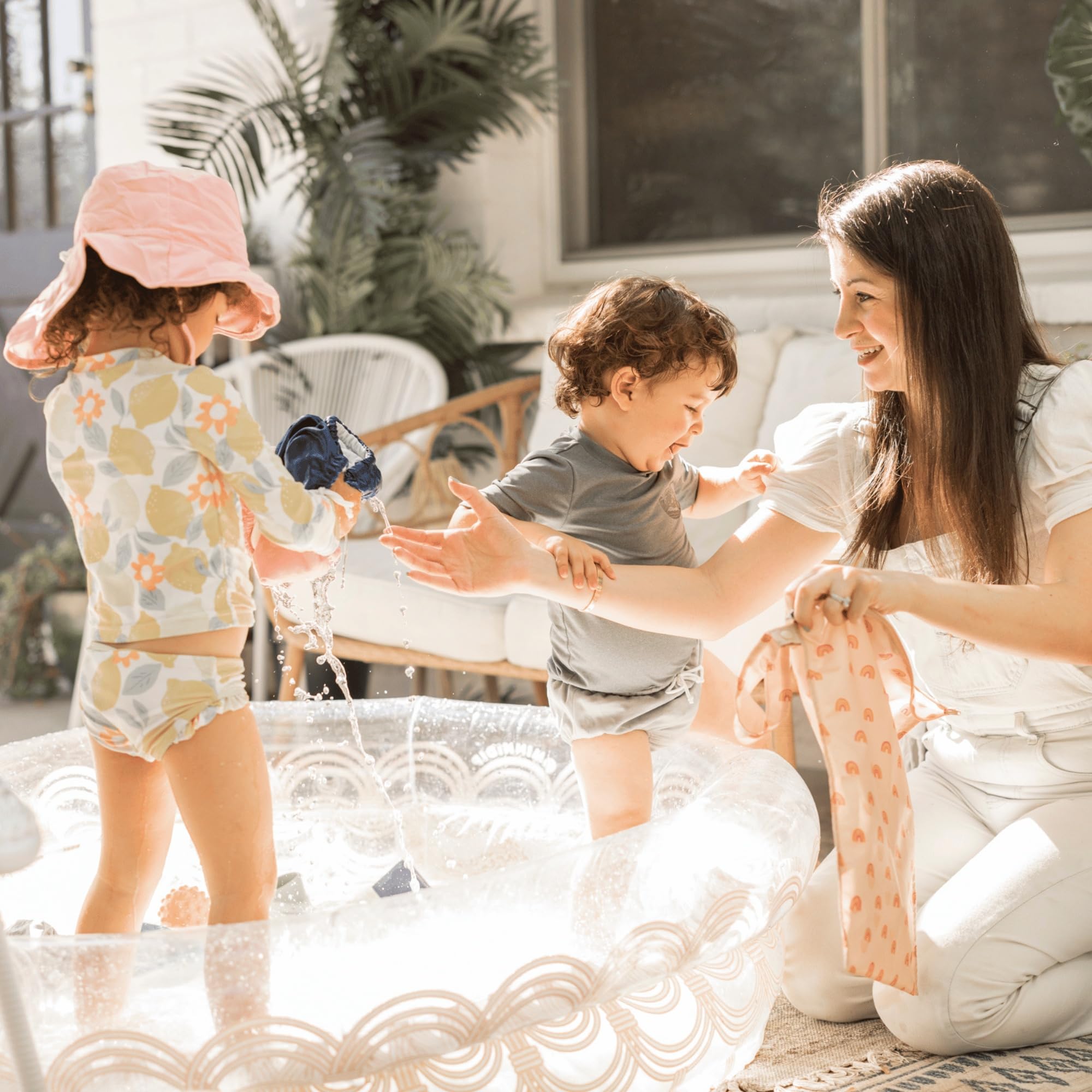 Open Tiny Twinkle wet bags showing spacious interior for swimsuits and clothes