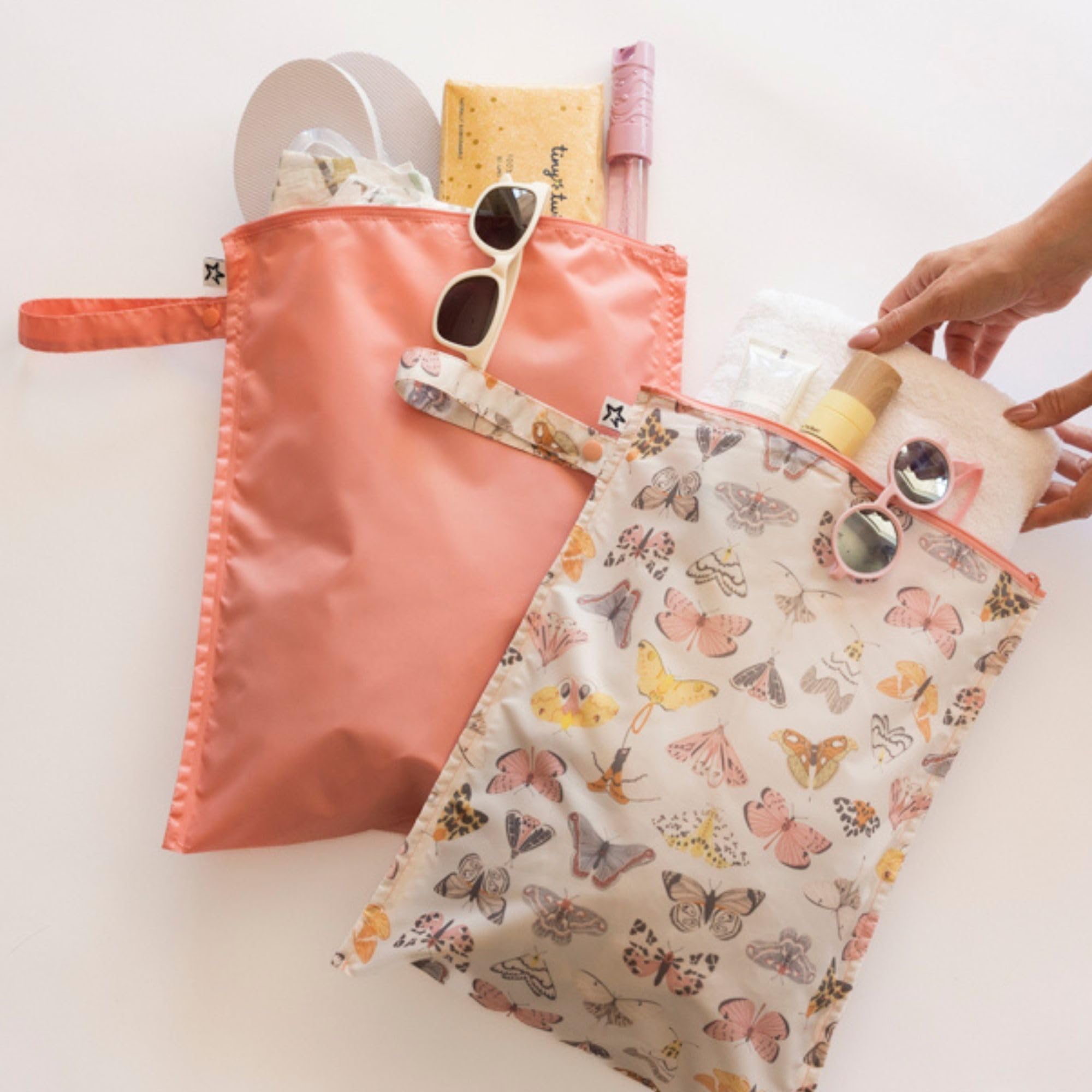 Tiny Twinkle Mess Proof Wet Bags quick-dry fabric, wipe-clean surface for fast cleanup.