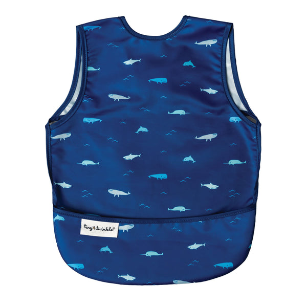Tiny Twinkle Ocean Life bib close-up showing waterproof surface for mess-free meals.