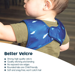 Tiny Twinkle Ocean Life bib providing protection from spills at mealtime.