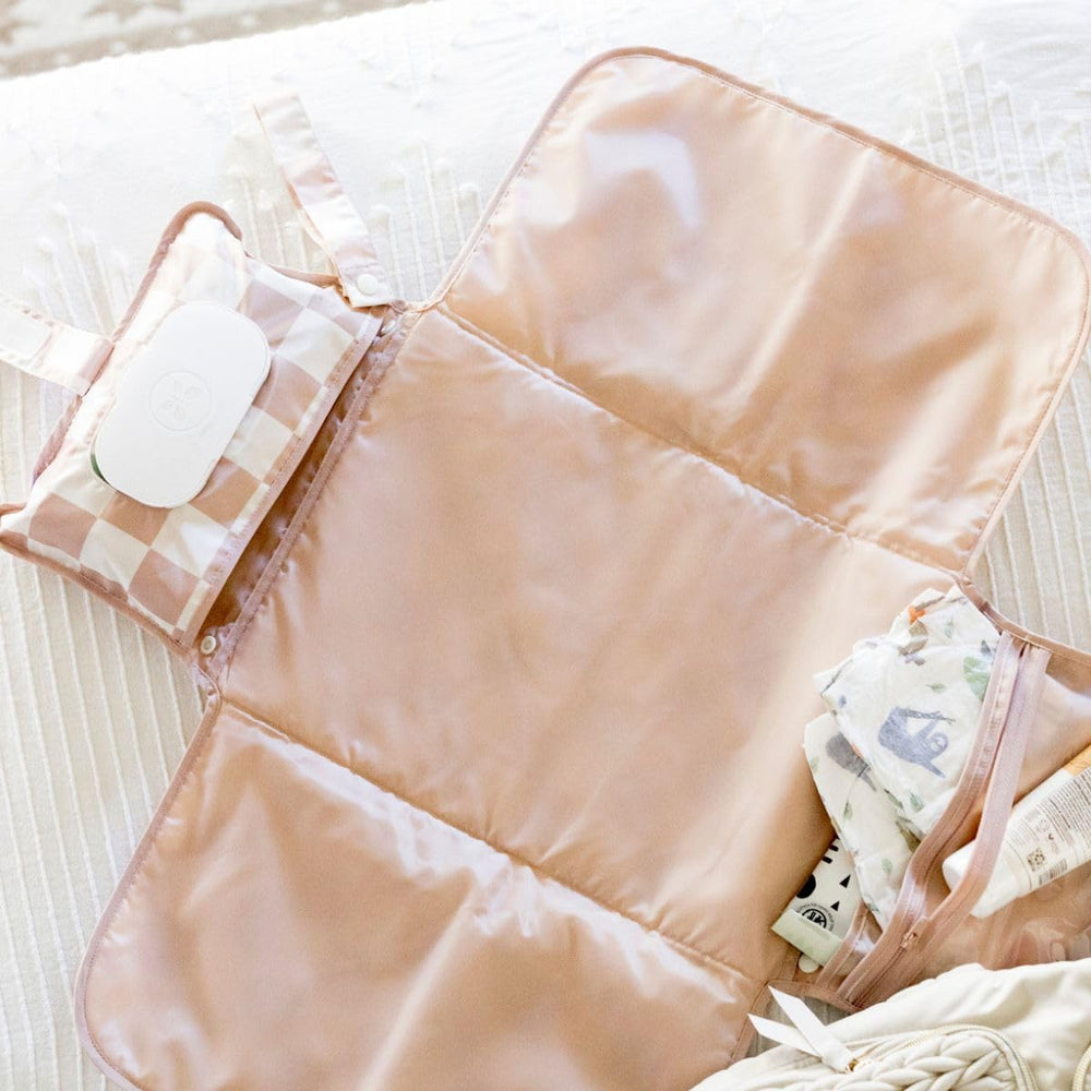Tiny Twinkle organized travel essentials pocket keeps items within reach