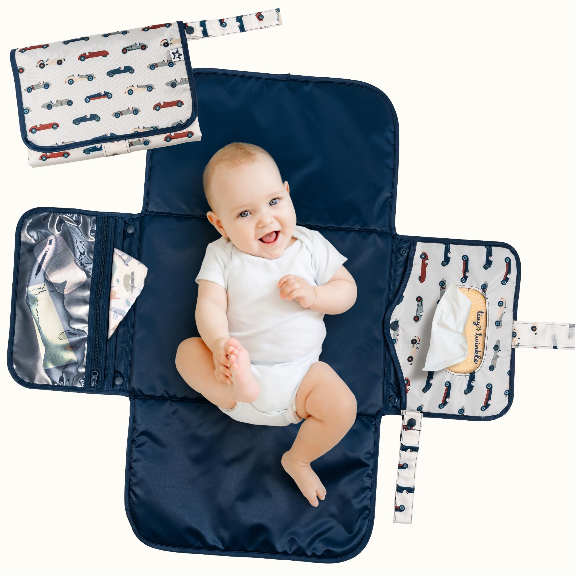 Tiny Twinkle portable changing pad in compact fold design for easy storage on the go.