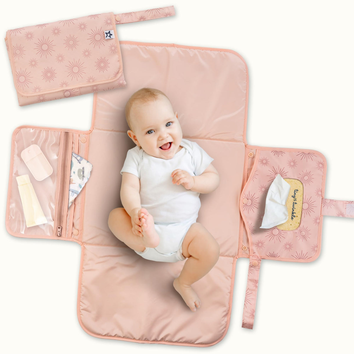 Tiny Twinkle portable changing pad folded to 7x10 inches for easy on the go use