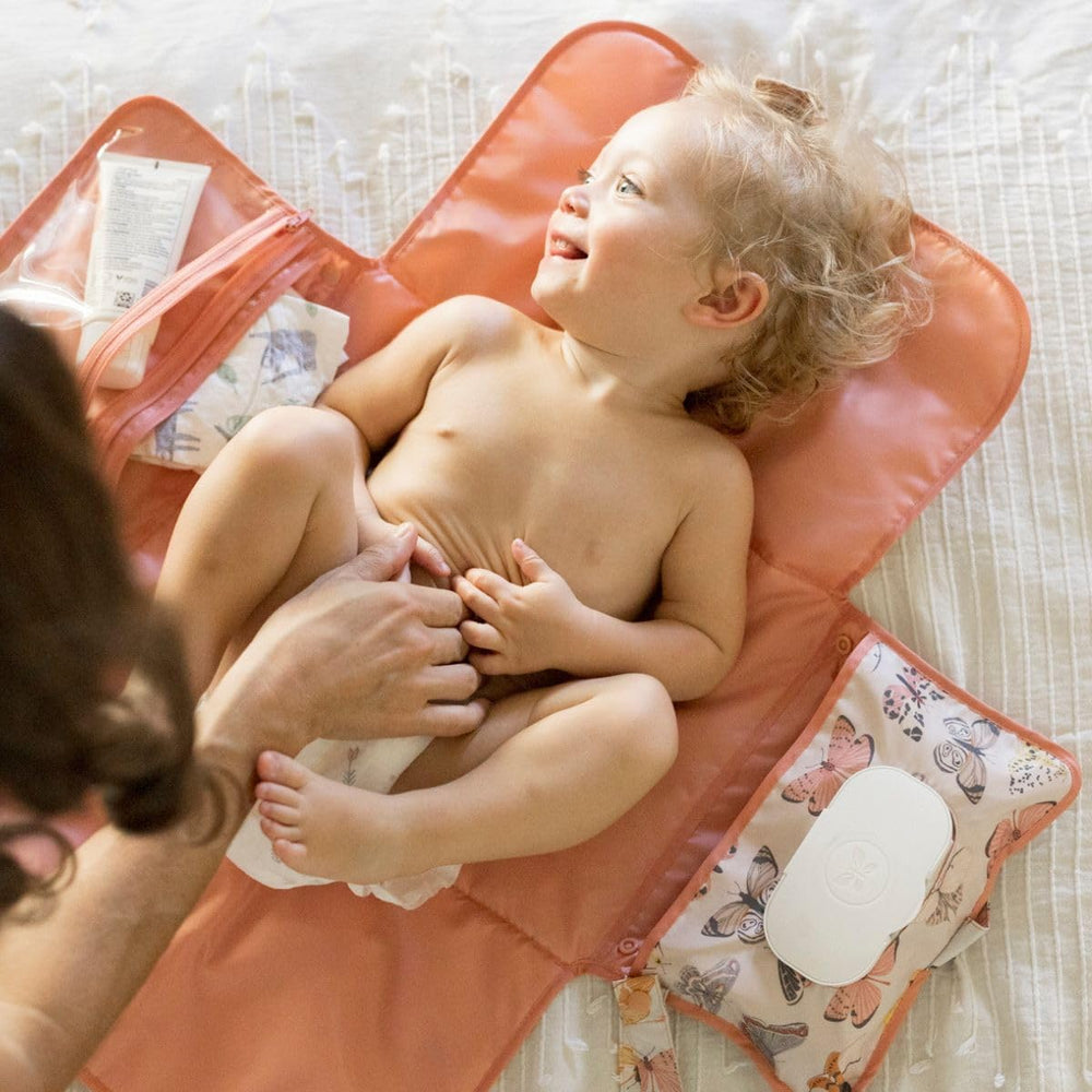 Tiny Twinkle portable changing pad stroller-clip secures for outings