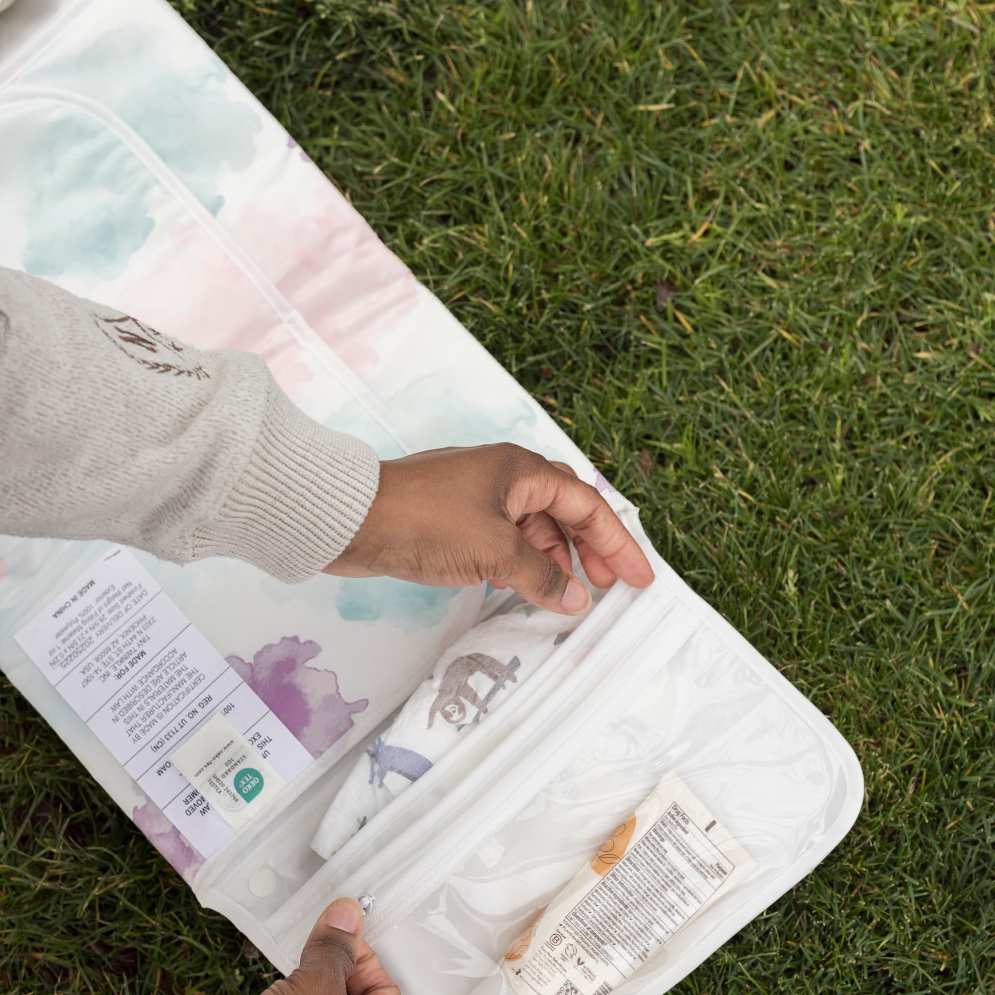 Tiny Twinkle waterproof, wipeable surface for easy cleanup after changes.