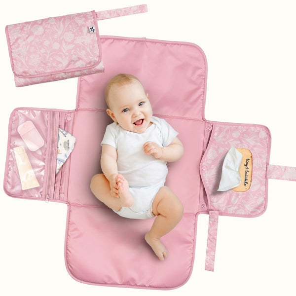 Tiny Twinkle portable changing pad folded compact for easy travel and quick changes.