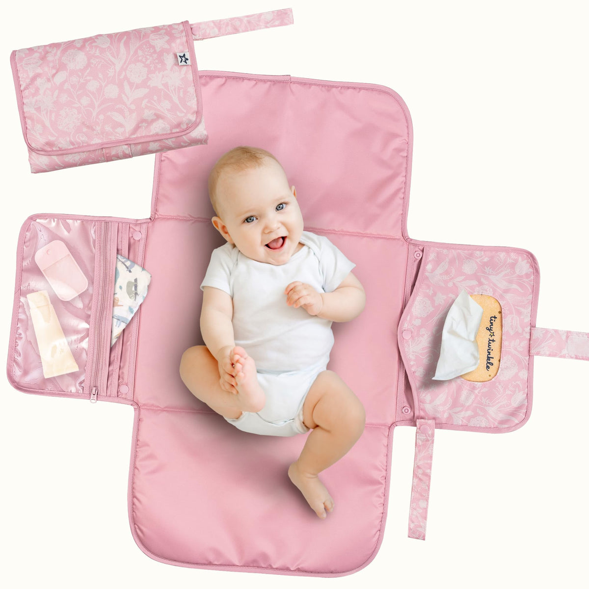 Tiny Twinkle portable changing pad folded compact for easy travel and quick changes.