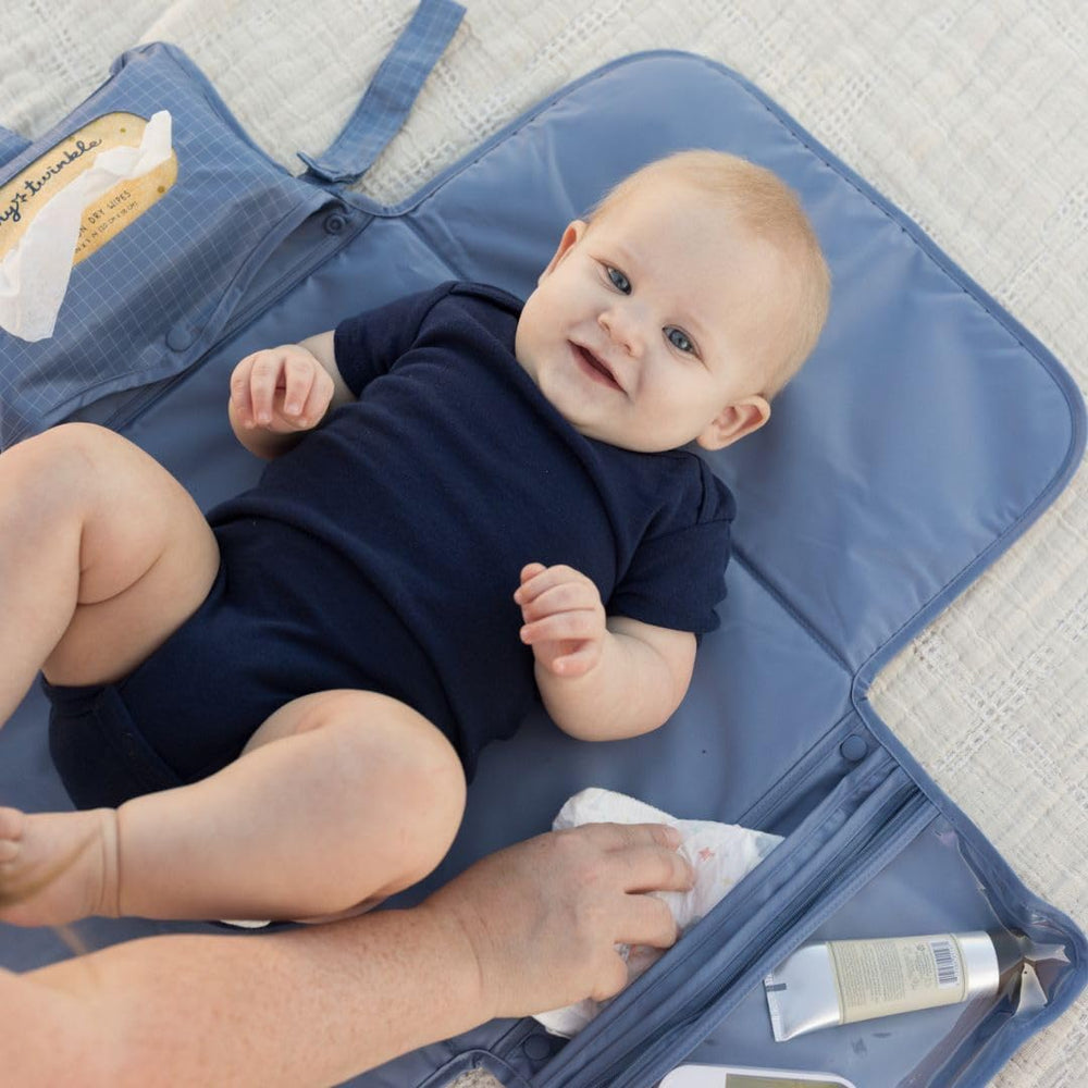 Tiny Twinkle travel-ready changing pad fits cars and parks.