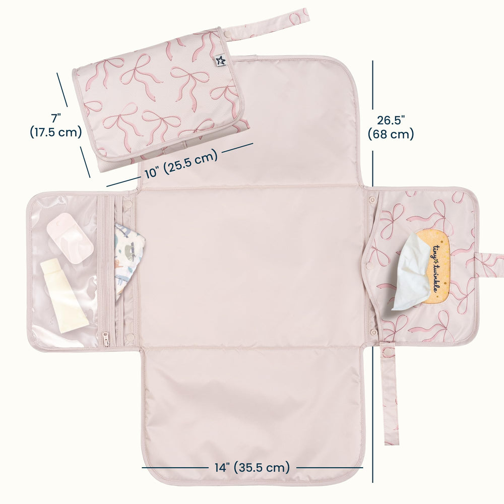 Tiny Twinkle pad with wipes pocket for quick one-handed diaper changes