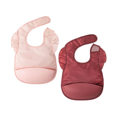 Tiny Twinkle silicone bib with deep-pocket traps spills for mess-free meals.