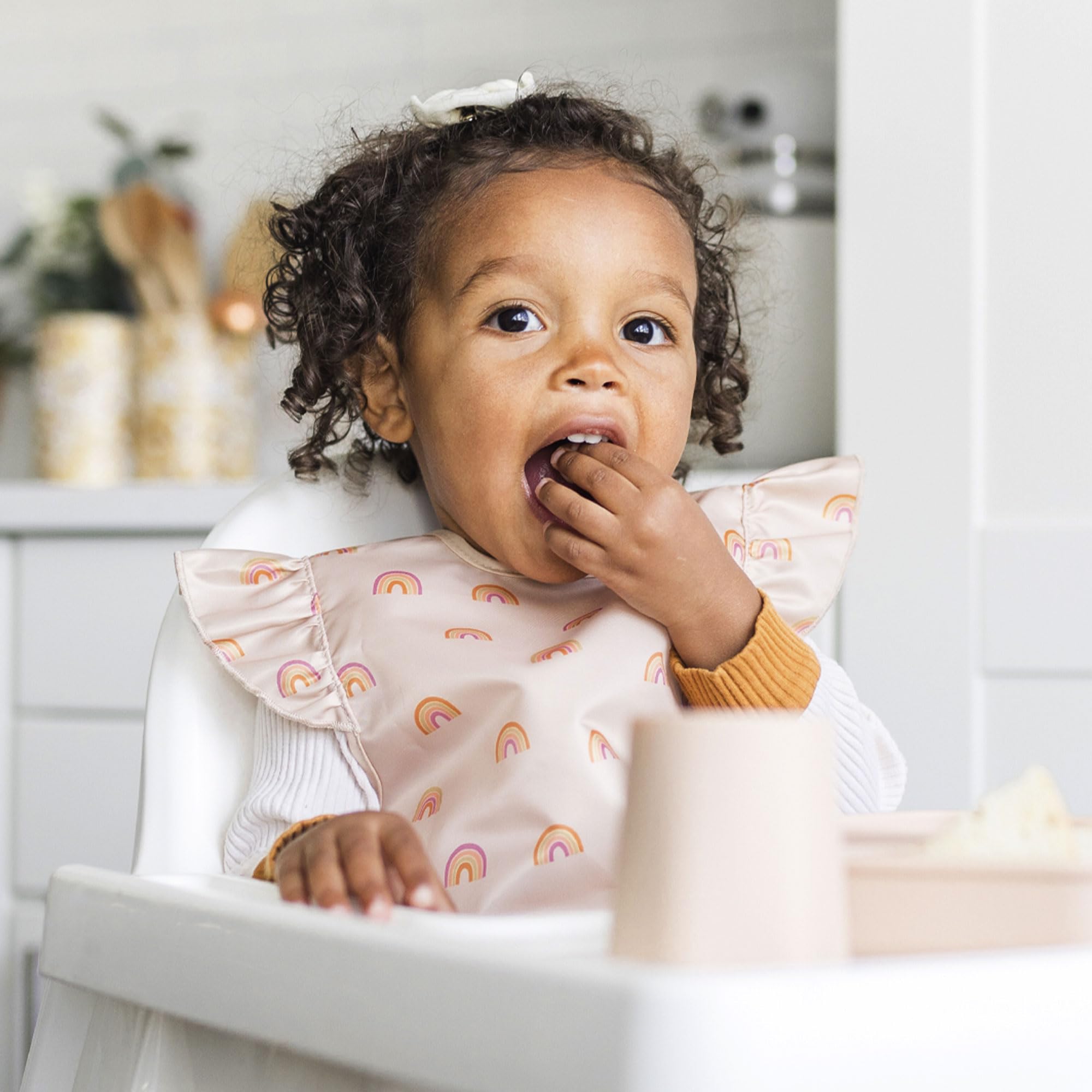 Tiny Twinkle bib size range six to twenty-four months for growing toddlers.