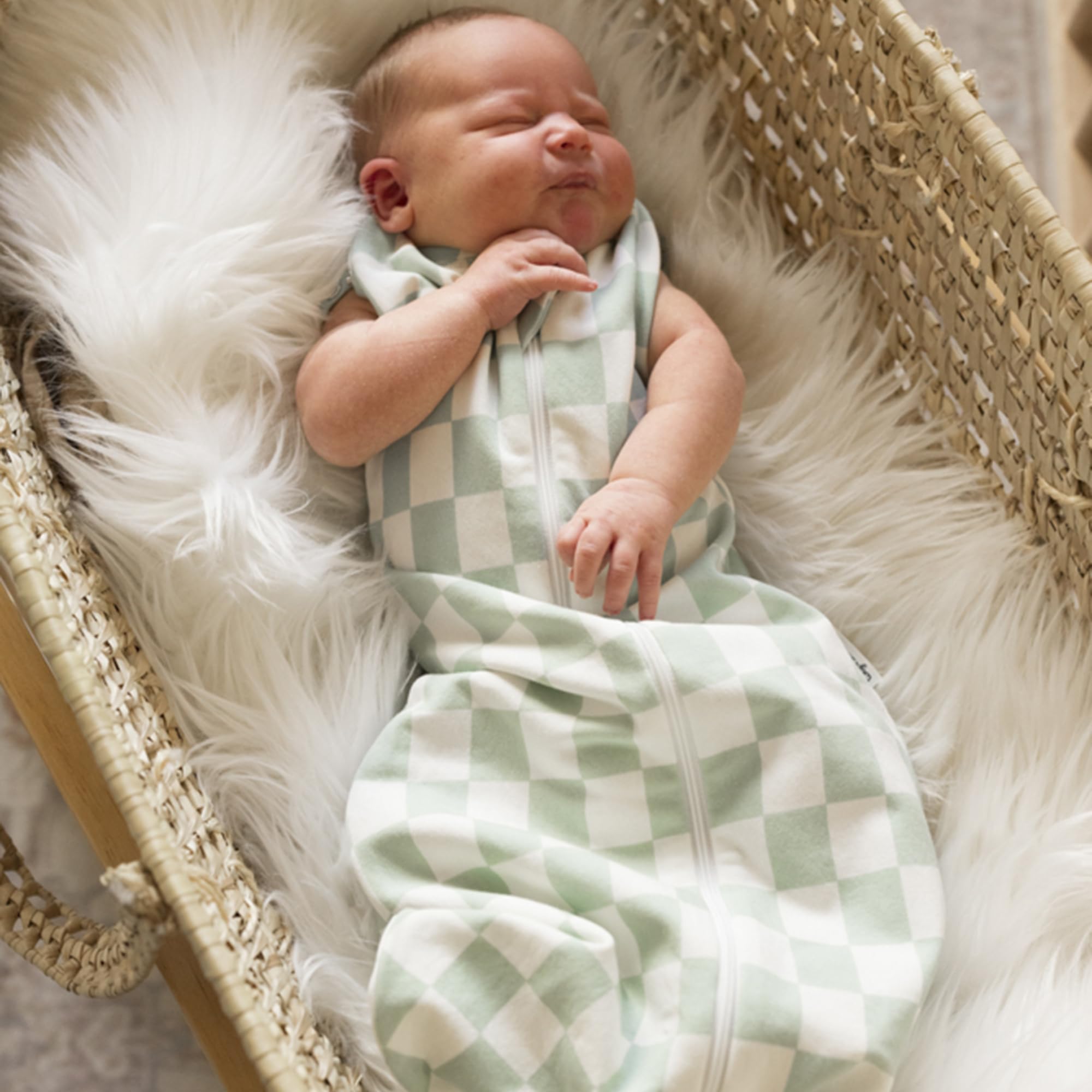 Swaddle-transition snaps on Tiny Twinkle sleep sack enable easy transition.