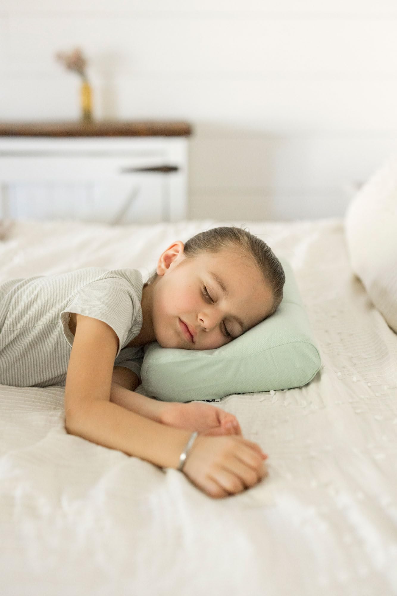 Removable cover on Tiny Twinkle pillow for easy cleaning