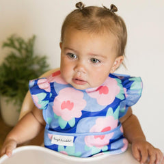 Tiny Twinkle bib waterproof at mealtime demonstrating reliable splash protection.