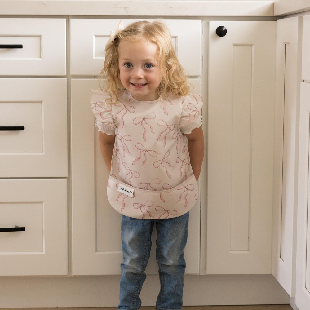 Tiny Twinkle waterproof bib for toddlers prevents spills on clothes