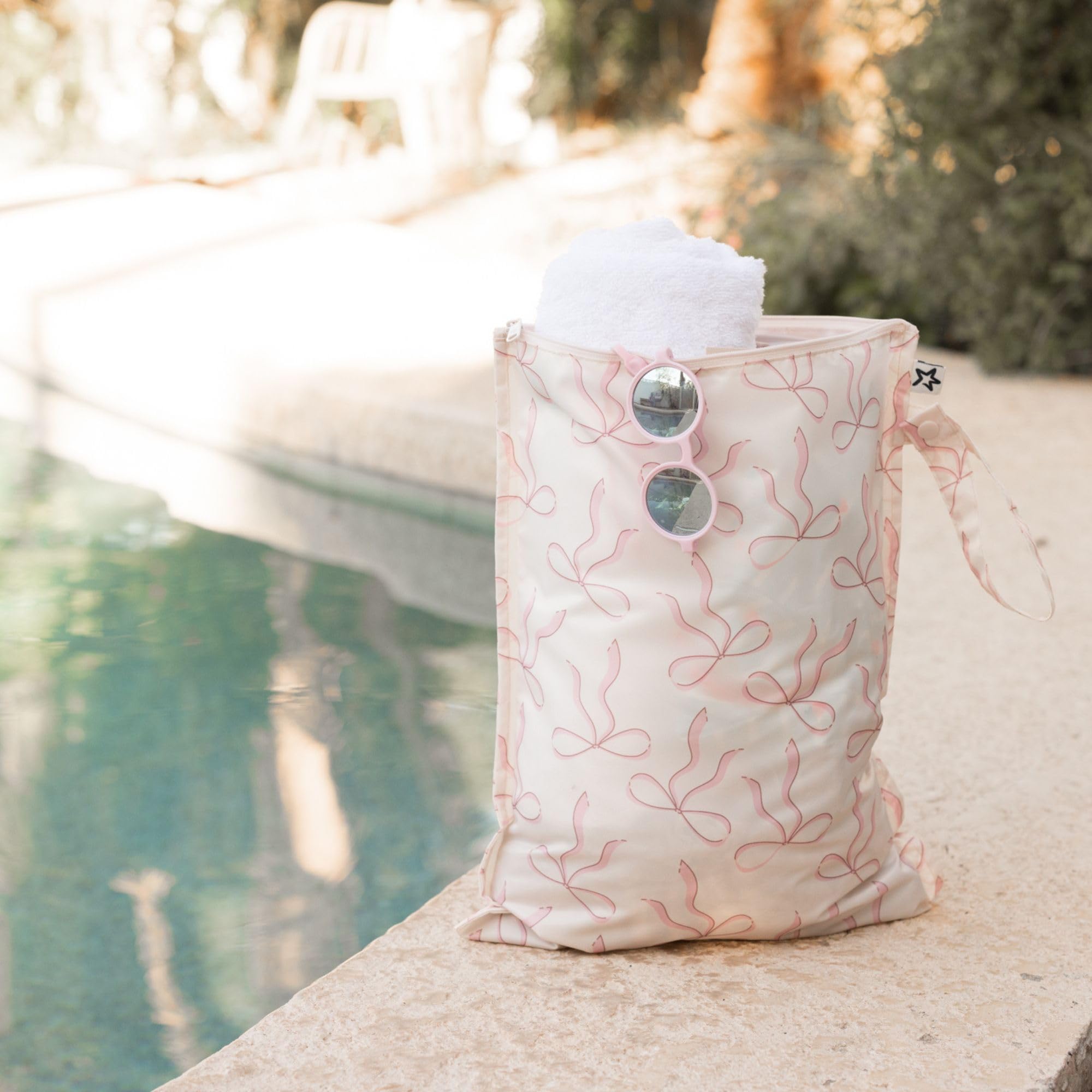 Tiny Twinkle swimsuit storage keeps pool gear organized