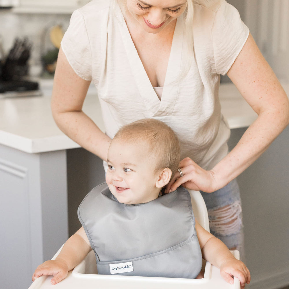 Tiny Twinkle wipeable bib cleans quickly after snacks.