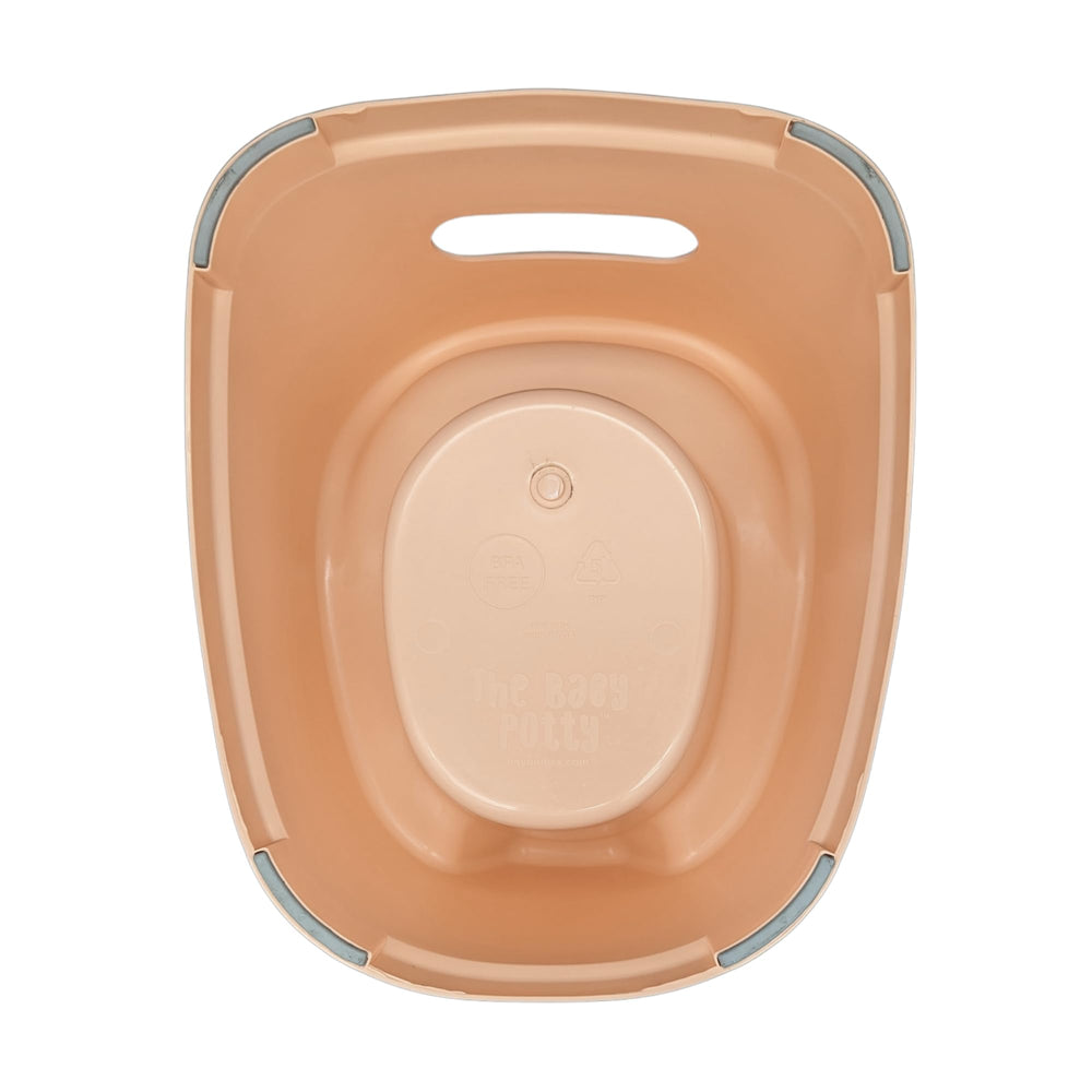 Tiny Undies Baby Potty high splash guard reduces mess during potty
