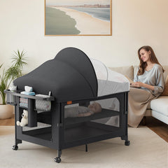 TinyGlow 4-in-1 baby bassinet pack and play setup showing versatile modes.