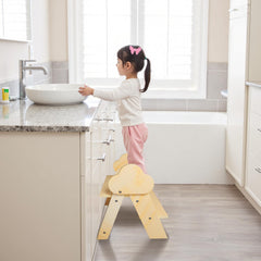TinyHaven dinosaur cloud design stool open, ready for potty training.