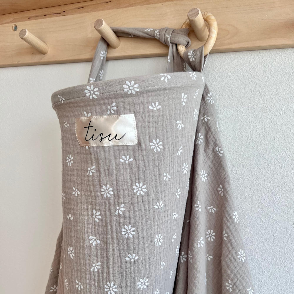 TISU Nursing Cover Beige Daisy shown in a calm setup, highlighting breathable fabric for comfort.