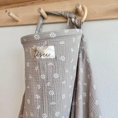 TISU Nursing Cover Beige Daisy shown in a calm setup, highlighting breathable fabric for comfort.