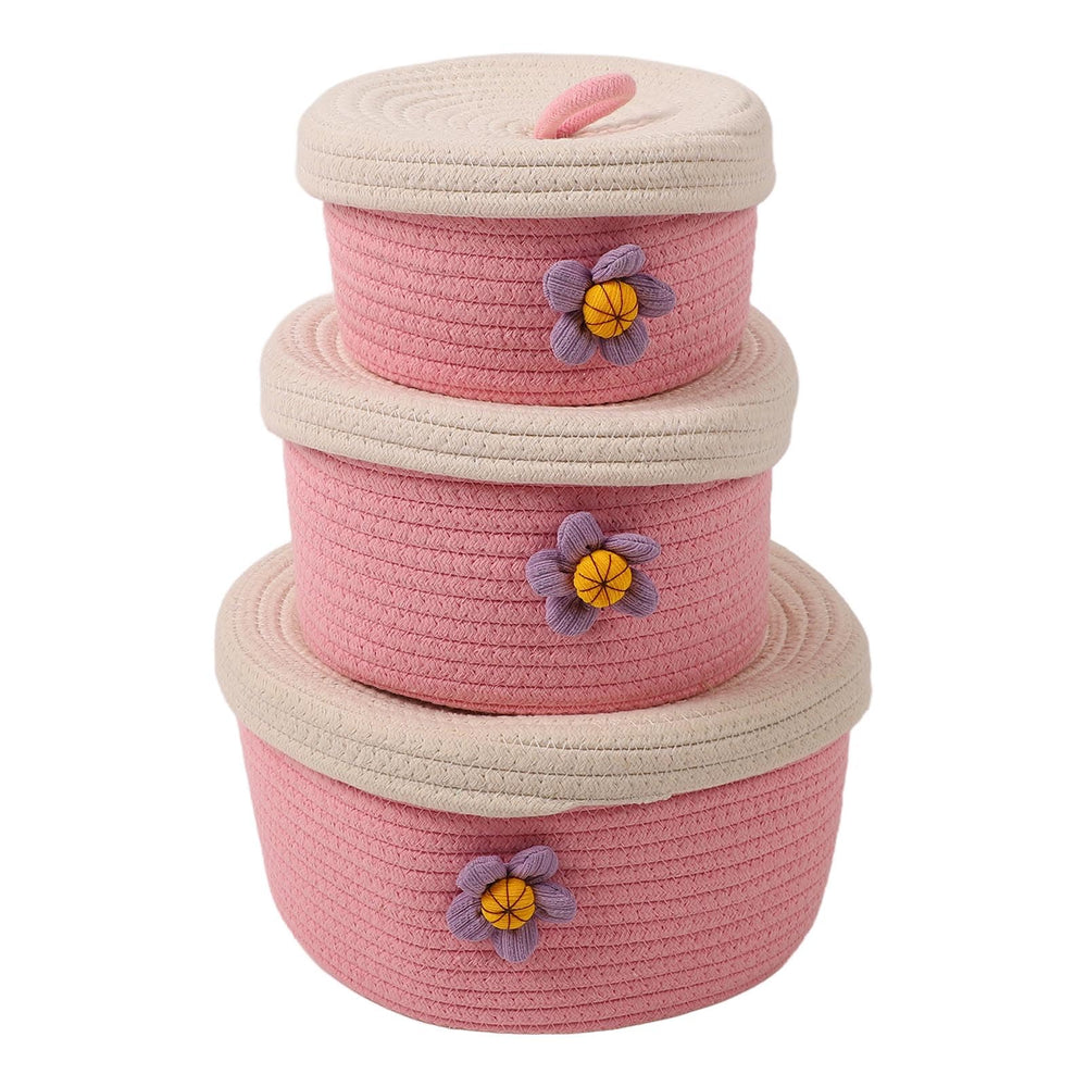 Tissting round storage baskets with lids in pink, perfect for toy storage and stylish organization.