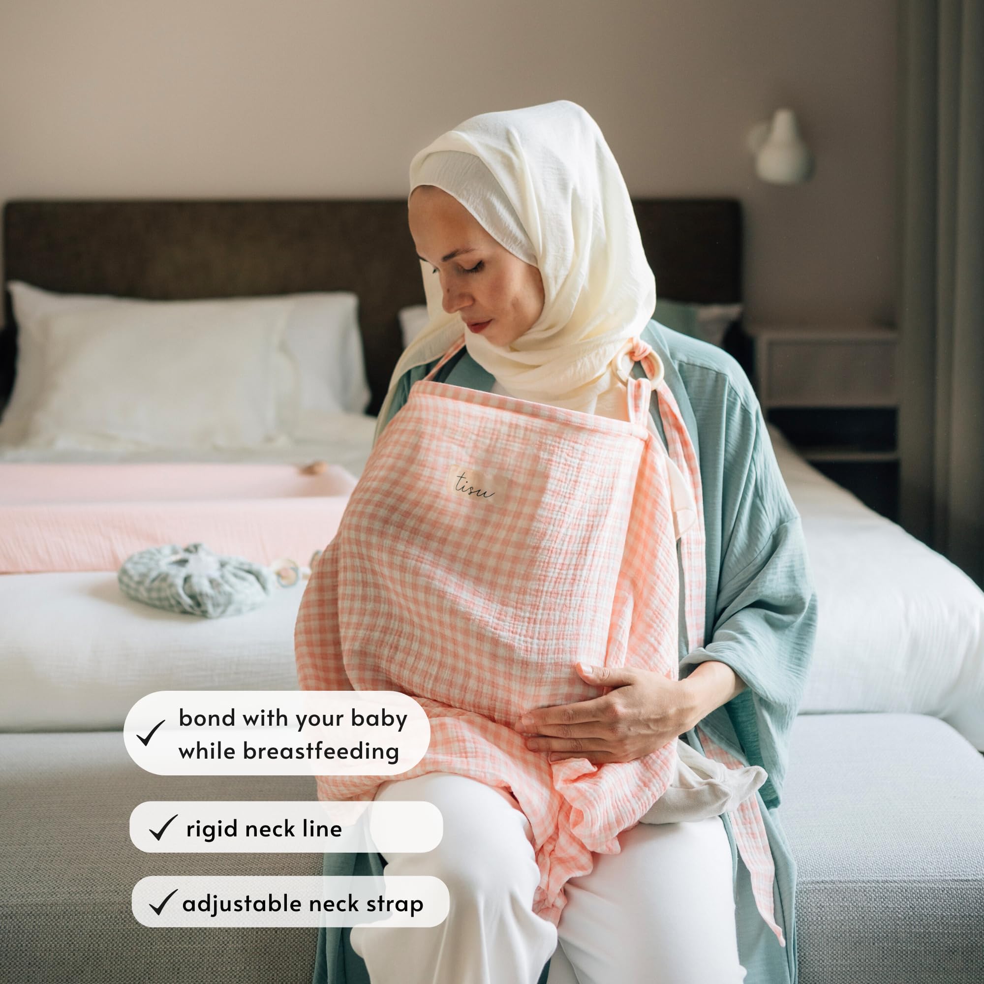 TISU nursing cover with arched neckline and adjustable strap for eye contact.