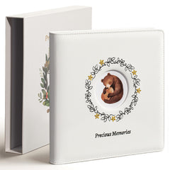 Tivellary leather embroidery baby book front cover showing forest design and premium craftsmanship