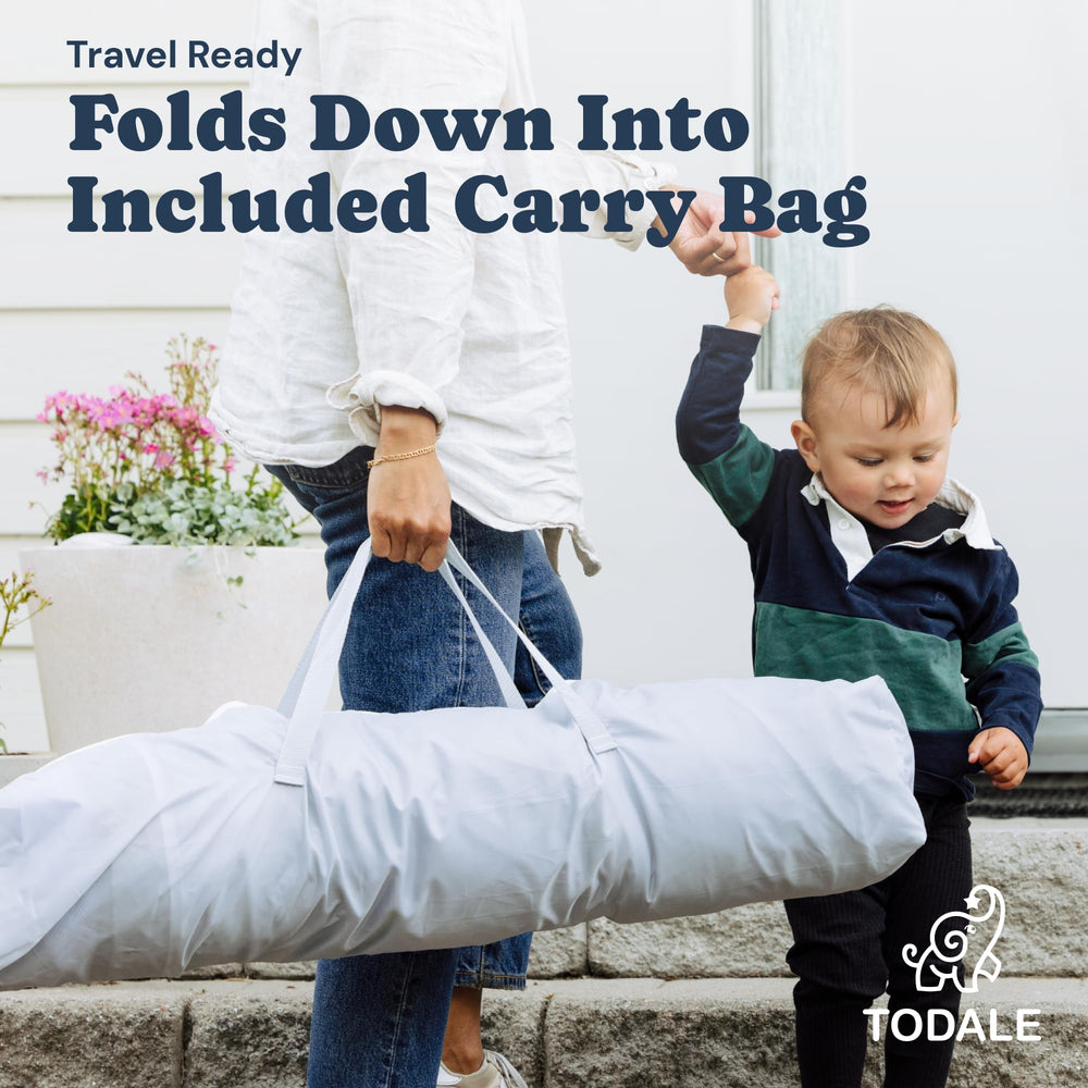 Todale Baby Play Yard—portable setup for indoor or outdoor use.