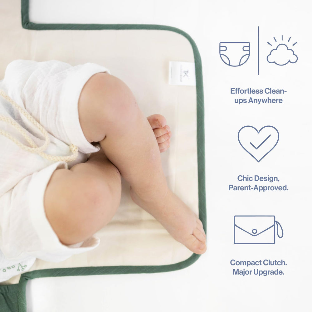 Toddlekind Mini Maven wave-stitching detail highlights chic design during diaper changes.