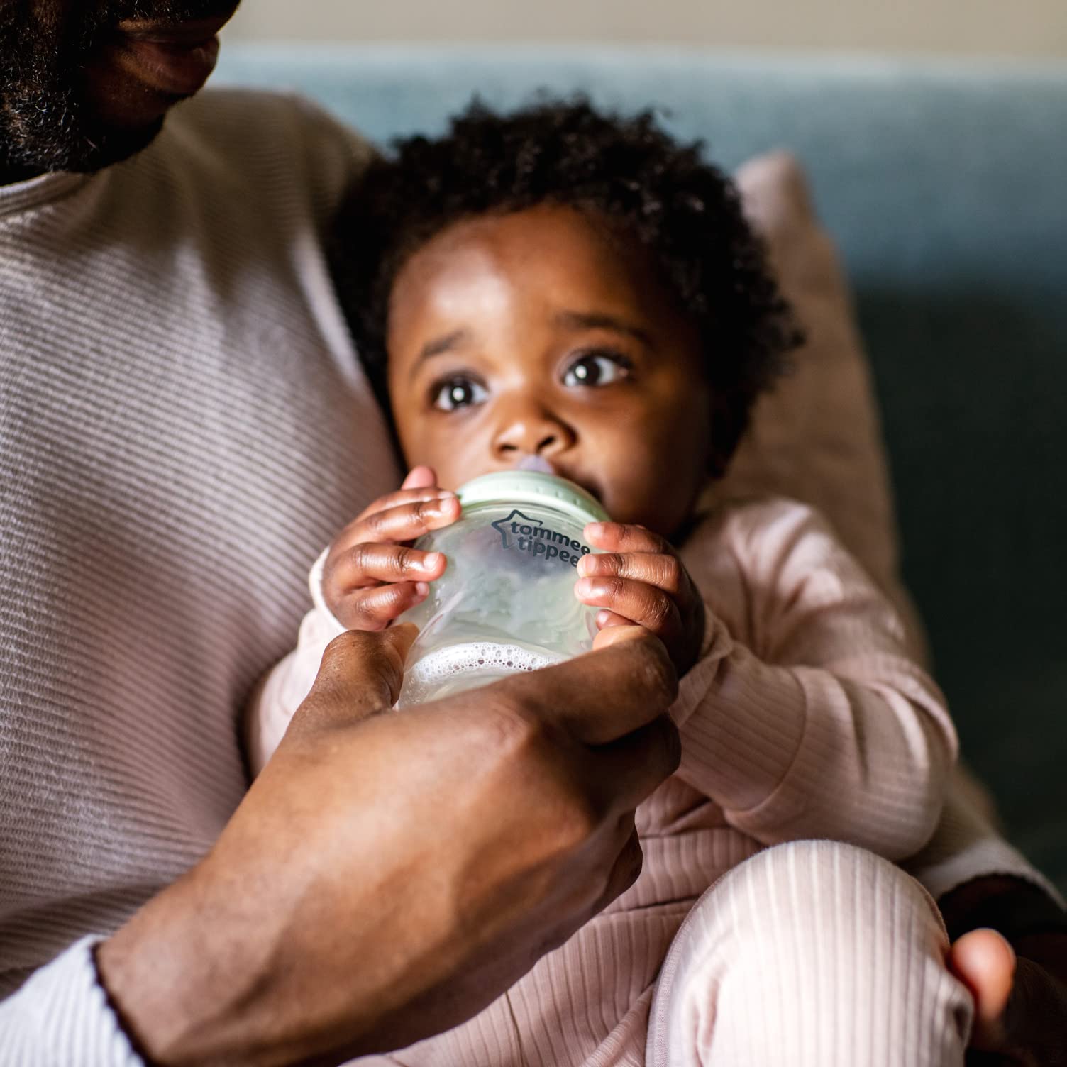 Tommee Tippee CTN Teats Medium Flow baby feeding action in a calm moment