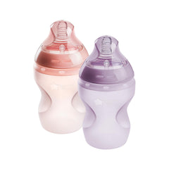 Tommee Tippee Natural Start bottle in pink and purple with soft silicone feel for comforting feeds