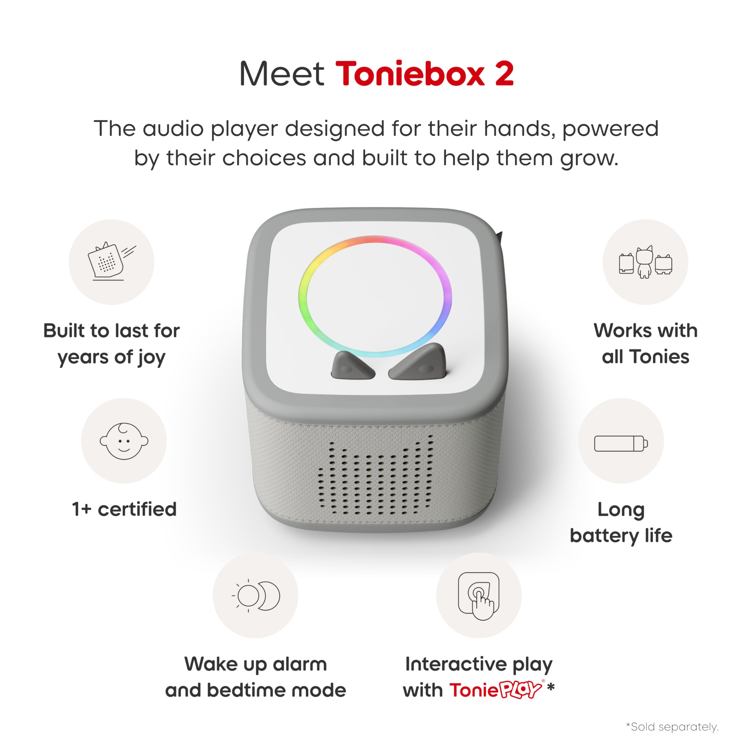Side ears on Toniebox control volume during quiet reading sessions.