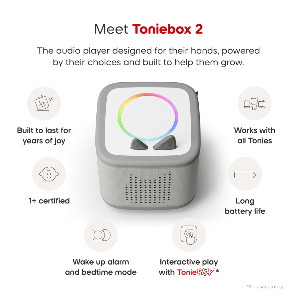 Side ears on Toniebox control volume during quiet reading sessions.