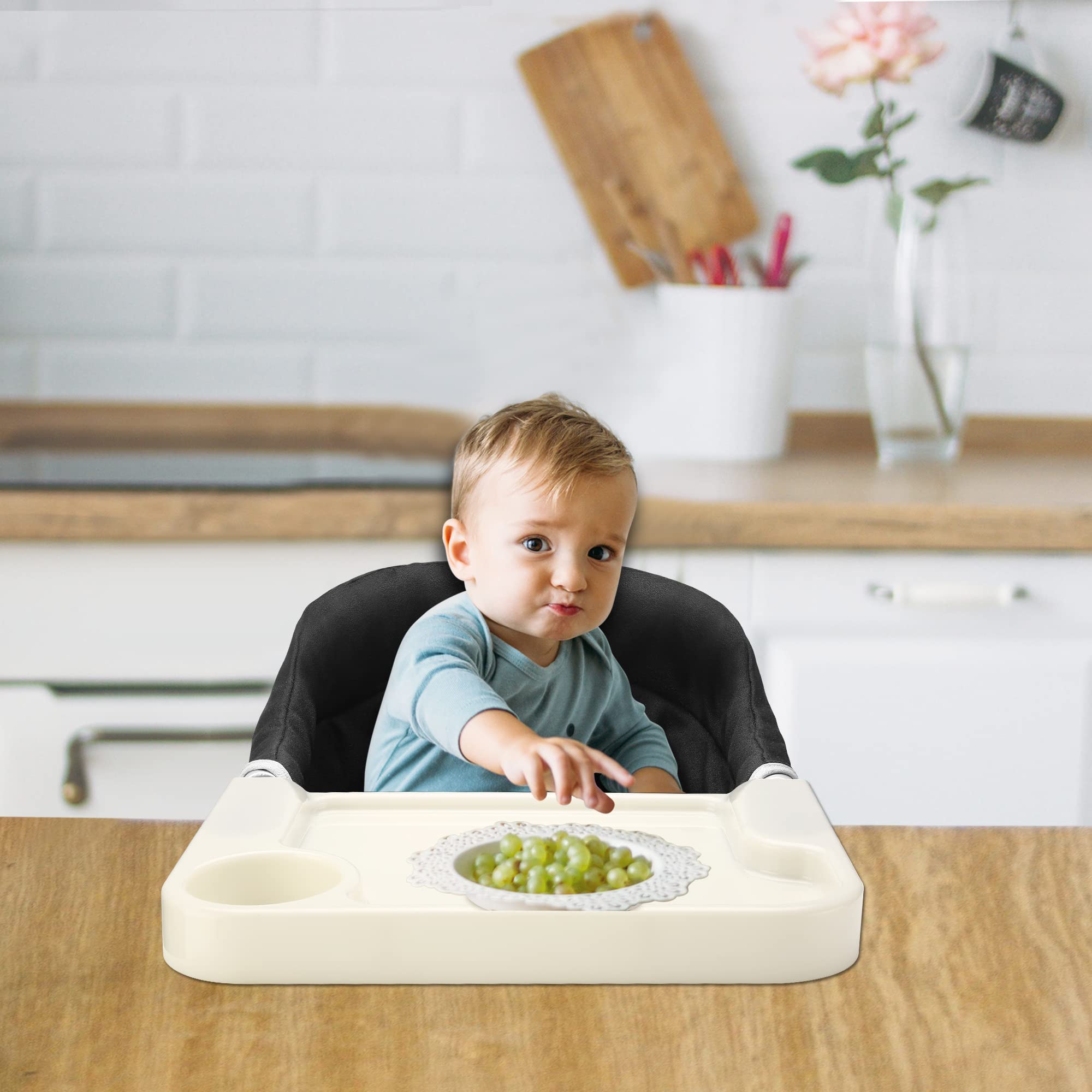 Toogel portable baby chair in use at home or cafe