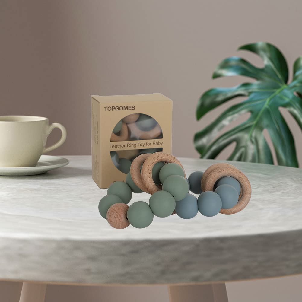 TOPGOMES natural materials teether supports teething comfort.